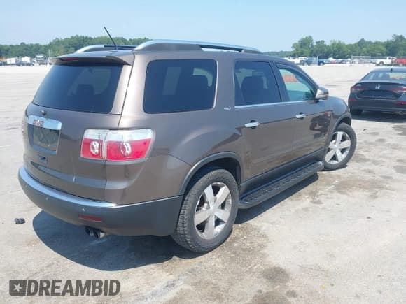 ✅ 2009 GMC Acadia SLT1 • VIN: 1GKER23D09J147789 • Лот: 42882504. Опубликован ранее на IAAI с пробегом 203 880 миль. Бесплатный доступ к архиву аукционных продаж из США и подробный отчёт об истории автомобиля на DreamBid. Изображение 4.