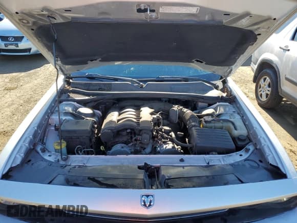 ✅ 2009 Dodge Challenger SE • VIN: 2B3LJ44V59H561537 • Lot: 86720334. Wystawiony na Copart z przebiegiem 163 233 mil. Bezpłatny archiwum sprzedaży aukcyjnych z USA i szczegółowy raport historii pojazdu na DreamBid. Zdjęcie 11.