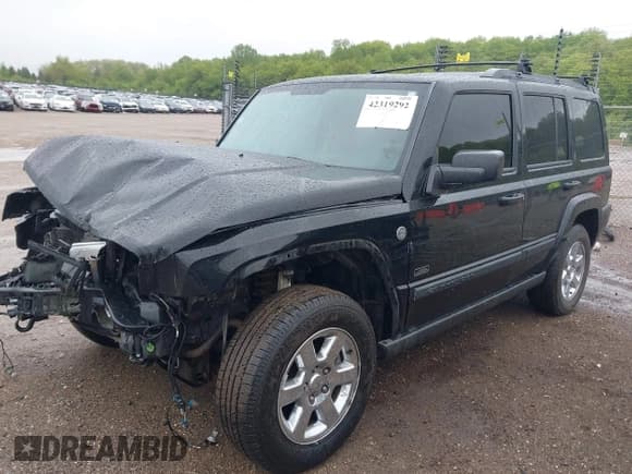 ✅ 2007 Jeep Commander Sport • VIN: 1J8HG48P17C632997 • Lot: 42319292. Listed on IAAI with 99,129 mi. Free auction sales archive from the USA and detailed vehicle history report at DreamBid. Image 2.