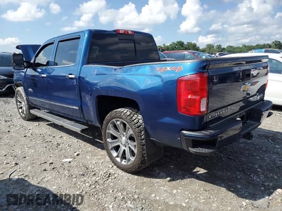 2018 Chevrolet Silverado 1500 High Country with VIN 3GCUKTEJ1JG419535, listed as a Copart auction lot 64389945 with 113,452 mi miles and Salvage title. Bid and sale history available at DreamBid. Image 2.
