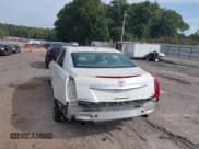 ✅ 2014 Cadillac CTS Luxury AWD • VIN: 1G6AX5S30E0187450 • Lot: 43244469. Listed on IAAI with 103,604 mi. Free auction sales archive from the USA and detailed vehicle history report at DreamBid. Image 3.