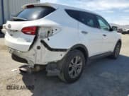 ✅ 2014 Hyundai Santa Fe • VIN: 5XYZTDLB2EG181199 • Lot: 57638045. Wystawiony na Copart z przebiegiem 95 056 mil. Bezpłatny archiwum sprzedaży aukcyjnych z USA i szczegółowy raport historii pojazdu na DreamBid. Zdjęcie 3.