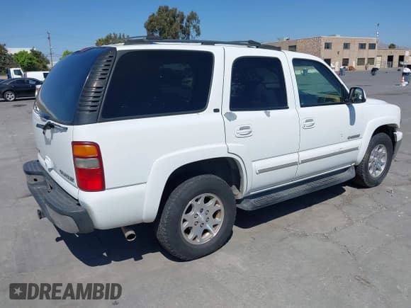 ✅ 2003 Chevrolet Tahoe LS • VIN: 1GNEK13T33J238443 • Lot: 42425507. Listed on IAAI with 296,631 mi. Free auction sales archive from the USA and detailed vehicle history report at DreamBid. Image 4.