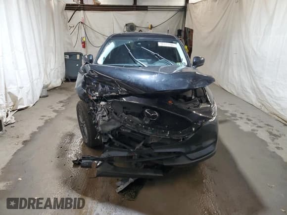 ✅ 2021 Mazda CX-5 Touring • VIN: JM3KFBCM4M0413456 • Lot: 92471105. Wystawiony na Copart z przebiegiem 42 432 mil. Bezpłatny archiwum sprzedaży aukcyjnych z USA i szczegółowy raport historii pojazdu na DreamBid. Zdjęcie 5.