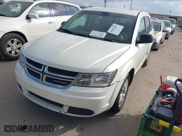 ✅ 2013 Dodge Journey Canada Value • VIN: 3C4PDCAB8DT713340 • Lot: 41537461. Listed on IAAI with 266,377 mi. Free auction sales archive from the USA and detailed vehicle history report at DreamBid. Image 2.