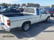 ✅ 1991 Toyota Pickup • VIN: JT4VN93D9M5018869 • Lot: 41809090. Listed on IAAI with 312,527 mi. Free auction sales archive from the USA and detailed vehicle history report at DreamBid. Image 4.