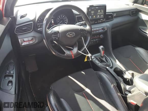 2020 Hyundai Veloster Premium z VIN KMHTG6AF0LU021017, wystawiony jako Copart lot #57514105 z przebiegiem 63 474 mil mil oraz Szkoda całkowita • Salvage title. Historia ofert i sprzedaży dostępna na DreamBid. Obrazek 8.