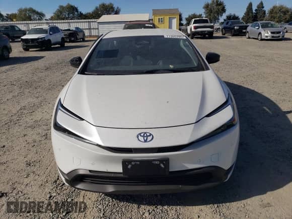 2025 Toyota Prius LE with VIN JTDACAAUXS3063658, listed as a Copart auction lot 71305795 with 2,278 mi miles and Salvage title. Bid and sale history available at DreamBid. Image 5.