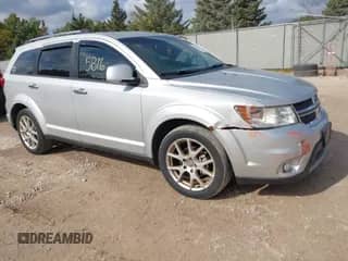 2012 Dodge Journey Crew with VIN 3C4PDCDG0CT146790, listed as a IAAI auction lot 43395816 with 208,441 mi miles and . Bid and sale history available at DreamBid. Image 1.