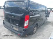 ✅ 2023 Ford Transit Cargo • VIN: 1FTYE1Y81PKA71257 • Lot: 42468254. Listed on IAAI with 68,499 mi. Free auction sales archive from the USA and detailed vehicle history report at DreamBid. Image 4.