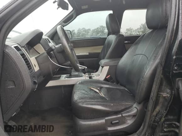 2010 Mercury Mariner Premier с VIN 4M2CN9HG7AKJ19586, выставлен на аукционе Copart как лот 80964085 с пробегом 192 530 миль миль и Списание • Salvage title. История ставок и продаж доступна на DreamBid. Изображение 7.