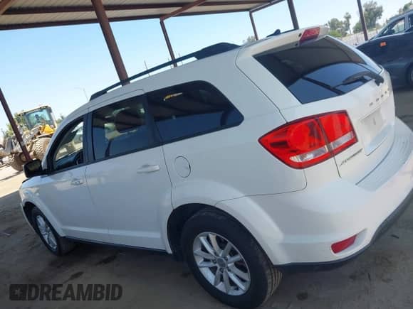 2015 Dodge Journey SXT z VIN 3C4PDCBB5FT568999, wystawiony jako IAAI lot #42527831 z przebiegiem 163 836 mil mil oraz . Historia ofert i sprzedaży dostępna na DreamBid. Obrazek 14.