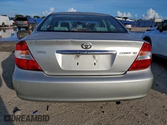 ✅ 2004 Toyota Camry LE • VIN: 4T1BE32K24U927912 • Lot: 94192665. Wystawiony na Copart z przebiegiem 181 558 mil. Bezpłatny archiwum sprzedaży aukcyjnych z USA i szczegółowy raport historii pojazdu na DreamBid. Zdjęcie 6.
