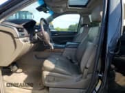 ✅ 2016 Chevrolet Tahoe LTZ • VIN: 1GNSKCKC0GR100818 • Lot: 81218375. Listed on Copart with 166,653 mi. Free auction sales archive from the USA and detailed vehicle history report at DreamBid. Image 7.