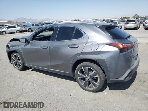 ✅ 2021 Lexus UX 200 • VIN: JTHX3JBH4M2041402 • Лот: 64621655. Опубликован ранее на Copart с пробегом 15 881 миль. Бесплатный доступ к архиву аукционных продаж из США и подробный отчёт об истории автомобиля на DreamBid. Изображение 2.