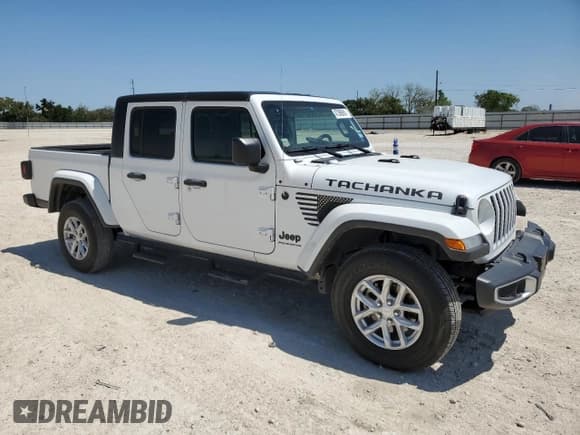✅ 2023 Jeep Gladiator Freedom • VIN: 1C6HJTAG1PL585720 • Лот: 47386855. Опубликован ранее на Copart с пробегом 14 525 миль. Бесплатный доступ к архиву аукционных продаж из США и подробный отчёт об истории автомобиля на DreamBid. Изображение 4.