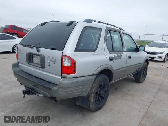 ✅ 2000 Isuzu Rodeo S • VIN: 4S2CK58W3Y4308219 • Lot: 41939765. Listed on IAAI with 241,486 mi. Free auction sales archive from the USA and detailed vehicle history report at DreamBid. Image 4.
