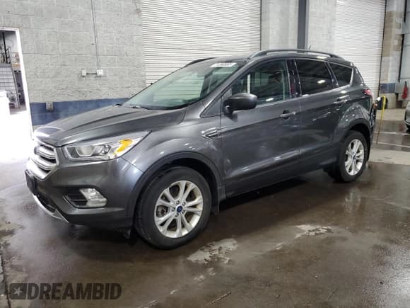✅ 2018 Ford Escape SEL • VIN: 1FMCU9HD8JUB25573 • Lot: 71280885. Listed on Copart with 125,289 mi. Free auction sales archive from the USA and detailed vehicle history report at DreamBid. Image 1.