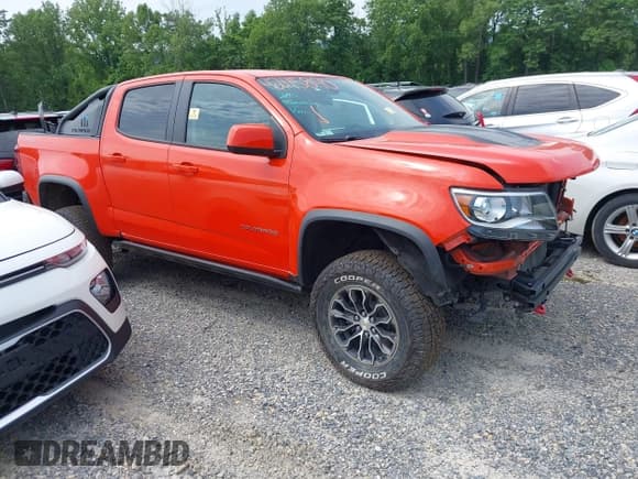 ✅ 2022 Chevrolet Colorado 4WD ZR2 • VIN: 1GCGTEEN1N1110502 • Лот: 42115890. Опубликован ранее на IAAI с пробегом 52 198 миль. Бесплатный доступ к архиву аукционных продаж из США и подробный отчёт об истории автомобиля на DreamBid. Изображение 1.