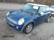 ✅ 2002 MINI Hardtop • VIN: WMWRC33432TC36898 • Lot: 43914325. Listed on IAAI with 131,840 mi. Free auction sales archive from the USA and detailed vehicle history report at DreamBid. Image 2.