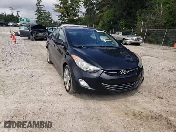 2013 Hyundai Elantra Limited z VIN KMHDH4AE1DU792665, wystawiony jako Copart lot #71178005 z przebiegiem 175 847 mil mil oraz Szkoda całkowita • Salvage title. Historia ofert i sprzedaży dostępna na DreamBid. Obrazek 13.