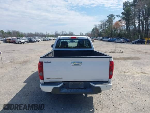 2012 Chevrolet Colorado Work Truck с VIN 1GCESBF99C8151006, выставлен на аукционе IAAI как лот 41860971 с пробегом 223 712 миль миль и . История ставок и продаж доступна на DreamBid. Изображение 16.