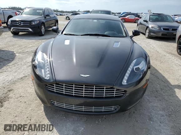 ✅ 2011 Aston Martin Rapide • VIN: SCFHDDAJ1BAF01096 • Lot: 78094834. Wystawiony na Copart z przebiegiem Nie podano. Bezpłatny archiwum sprzedaży aukcyjnych z USA i szczegółowy raport historii pojazdu na DreamBid. Zdjęcie 5.