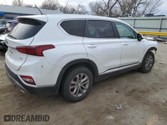 ✅ 2020 Hyundai Santa Fe SE • VIN: 5NMS2CAD8LH224241 • Lot: 80709893. Wystawiony na Copart z przebiegiem 82 779 mil. Bezpłatny archiwum sprzedaży aukcyjnych z USA i szczegółowy raport historii pojazdu na DreamBid. Zdjęcie 3.