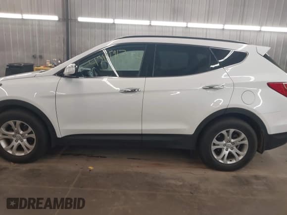 ✅ 2016 Hyundai Santa Fe • VIN: 5XYZUDLB5GG319835 • Лот: 43195919. Опубликован ранее на IAAI с пробегом 137 341 миль. Бесплатный доступ к архиву аукционных продаж из США и подробный отчёт об истории автомобиля на DreamBid. Изображение 15.