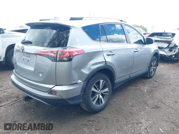 ✅ 2018 Toyota RAV4 XLE • VIN: 2T3WFREV1JW427878 • Lot: 42191031. Listed on IAAI with 97,264 mi. Free auction sales archive from the USA and detailed vehicle history report at DreamBid. Image 4.