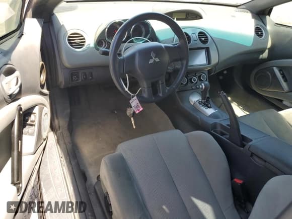 ✅ 2007 Mitsubishi Eclipse GS • VIN: 4A3AL25F17E009949 • Лот: 54116705. Опубликован ранее на Copart с пробегом 137 555 миль. Бесплатный доступ к архиву аукционных продаж из США и подробный отчёт об истории автомобиля на DreamBid. Изображение 8.