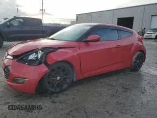 ✅ 2013 Hyundai Veloster w/Gray Int • VIN: KMHTC6AD9DU138767 • Lot: 85260395. Wystawiony na Copart z przebiegiem 176 745 mil. Bezpłatny archiwum sprzedaży aukcyjnych z USA i szczegółowy raport historii pojazdu na DreamBid. Zdjęcie 1.