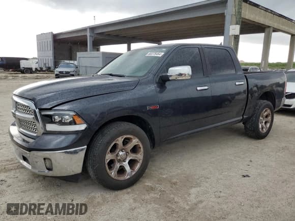 ✅ 2015 Ram 1500 Laramie • VIN: 1C6RR6NM5FS623887 • Lot: 66378464. Wystawiony na Copart z przebiegiem 196 514 mil. Bezpłatny archiwum sprzedaży aukcyjnych z USA i szczegółowy raport historii pojazdu na DreamBid. Zdjęcie 1.