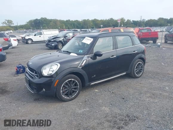 ✅ 2016 MINI Countryman S • VIN: WMWZC5C51GWU00947 • Lot: 43260196. Listed on IAAI with 163,879 mi. Free auction sales archive from the USA and detailed vehicle history report at DreamBid. Image 2.