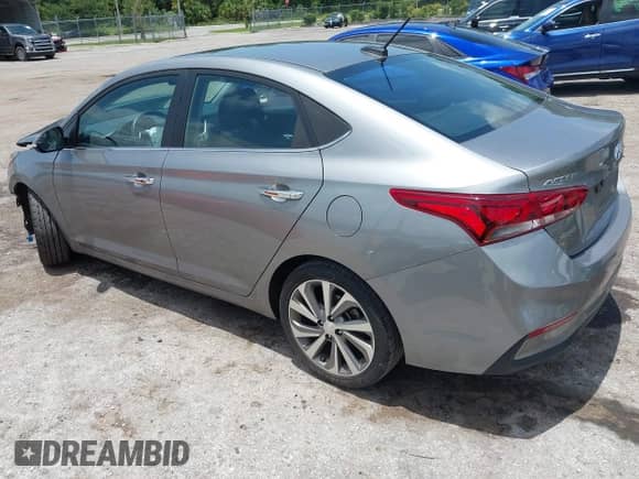 2022 Hyundai Accent Limited z VIN 3KPC34A6XNE165809, wystawiony jako IAAI lot #42734193 z przebiegiem 53 524 mil mil oraz . Historia ofert i sprzedaży dostępna na DreamBid. Obrazek 3.