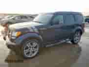 2011 Dodge Nitro Shock with VIN 1D4PT7GX9BW576481, listed as a Copart auction lot 49848955 with 156,015 mi miles and Salvage title. Bid and sale history available at DreamBid. Image 1.