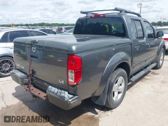 ✅ 2005 Nissan Frontier LE • VIN: 1N6AD07U85C413479 • Lot: 42500913. Listed on IAAI with 232,313 mi. Free auction sales archive from the USA and detailed vehicle history report at DreamBid. Image 4.