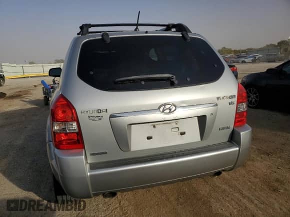 2007 Hyundai Tucson SE z VIN KM8JN12D47U501967, wystawiony jako Copart lot #77760684 z przebiegiem 137 683 mil mil oraz Szkoda całkowita • Salvage title. Historia ofert i sprzedaży dostępna na DreamBid. Obrazek 6.