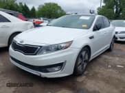 ✅ 2012 Kia Optima Hybrid • VIN: KNAGM4AD2C5035784 • Lot: 43102923. Listed on IAAI with 92,734 mi. Free auction sales archive from the USA and detailed vehicle history report at DreamBid. Image 2.
