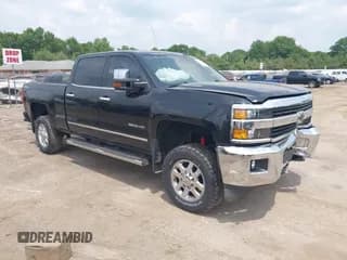 ✅ 2015 Chevrolet Silverado 2500HD LTZ • VIN: 1GC1KWE82FF590885 • Lot: 42491394. Listed on IAAI with 264,390 mi. Free auction sales archive from the USA and detailed vehicle history report at DreamBid. Image 1.