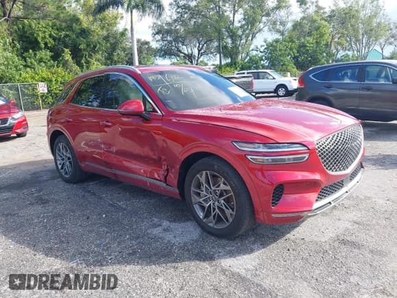 ✅ 2023 Genesis GV70 2.5T • VIN: KMUMADTB0PU136812 • Лот: 43545939. Опубликован ранее на IAAI с пробегом 26 721 миль. Бесплатный доступ к архиву аукционных продаж из США и подробный отчёт об истории автомобиля на DreamBid. Изображение 1.