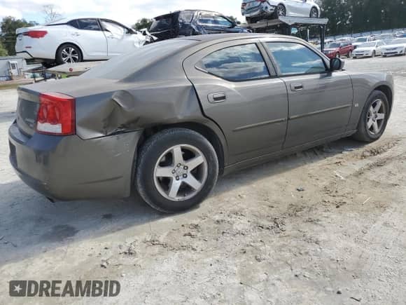 2010 Dodge Charger SXT с VIN 2B3CA3CV4AH242940, выставлен на аукционе Copart как лот 81041074 с пробегом 154 562 миль миль и На запчасти • Non repairable. История ставок и продаж доступна на DreamBid. Изображение 3.