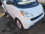 ✅ 2009 Smart fortwo Pure • VIN: WMEEJ31X99K292492 • Lot: 41029051. Listed on IAAI with 57,741 mi. Free auction sales archive from the USA and detailed vehicle history report at DreamBid. Image 6.