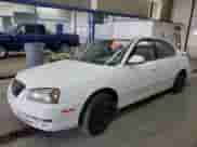 2004 Hyundai Elantra GLS z VIN KMHDN46D24U917410, wystawiony jako Copart lot #76782274 z przebiegiem 251 791 mil mil oraz Szkoda całkowita • Salvage title. Historia ofert i sprzedaży dostępna na DreamBid. Obrazek 1.