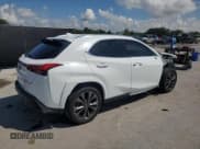 ✅ 2022 Lexus UX 200 F Sport • VIN: JTHE3JBH6N2055584 • Лот: 71727835. Опубликован ранее на Copart с пробегом 28 871 миль. Бесплатный доступ к архиву аукционных продаж из США и подробный отчёт об истории автомобиля на DreamBid. Изображение 3.
