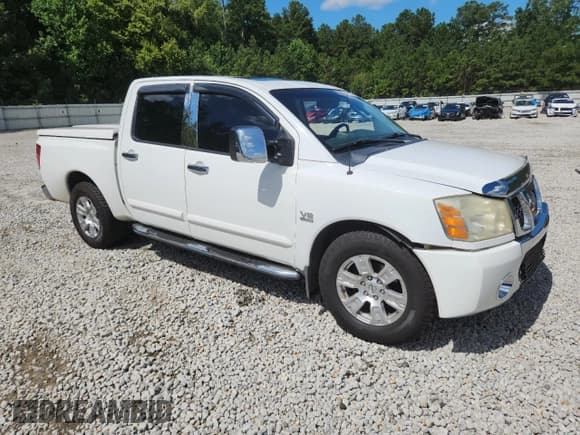 ✅ 2004 Nissan Titan LE • VIN: 1N6AA07A64N503182 • Lot: 65265455. Listed on Copart with 180,208 mi. Free auction sales archive from the USA and detailed vehicle history report at DreamBid. Image 4.