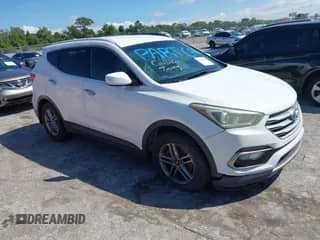 2017 Hyundai Santa Fe 2.4L z VIN 5NMZU3LB5HH018936, wystawiony jako IAAI lot #43336094 z przebiegiem 140 748 mil mil oraz . Historia ofert i sprzedaży dostępna na DreamBid. Obrazek 1.
