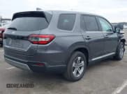 ✅ 2024 Honda Pilot EX-L • VIN: 5FNYG1H59RB004311 • Lot: 41307836. Listed on IAAI with 14,028 mi. Free auction sales archive from the USA and detailed vehicle history report at DreamBid. Image 4.