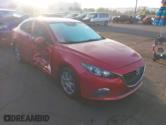 ✅ 2016 Mazda 3 i Sport • VIN: JM1BM1T72G1343375 • Lot: 43627040. Listed on IAAI with 137,020 mi. Free auction sales archive from the USA and detailed vehicle history report at DreamBid. Image 1.