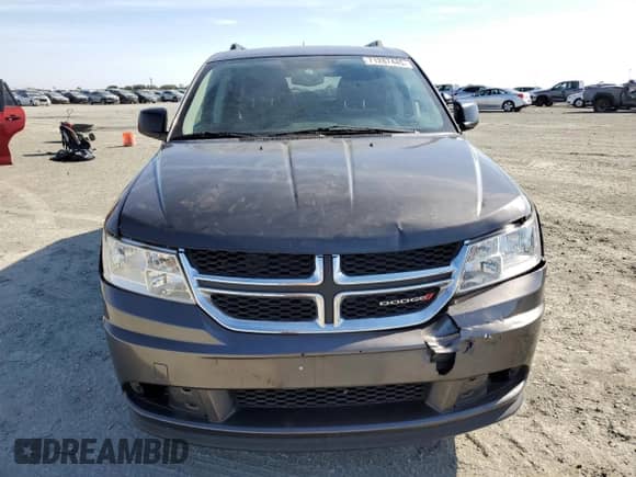 2017 Dodge Journey SE with VIN 3C4PDCAB3HT551168, listed as a Copart auction lot 71287445 with 148,553 mi miles and Salvage title. Bid and sale history available at DreamBid. Image 5.